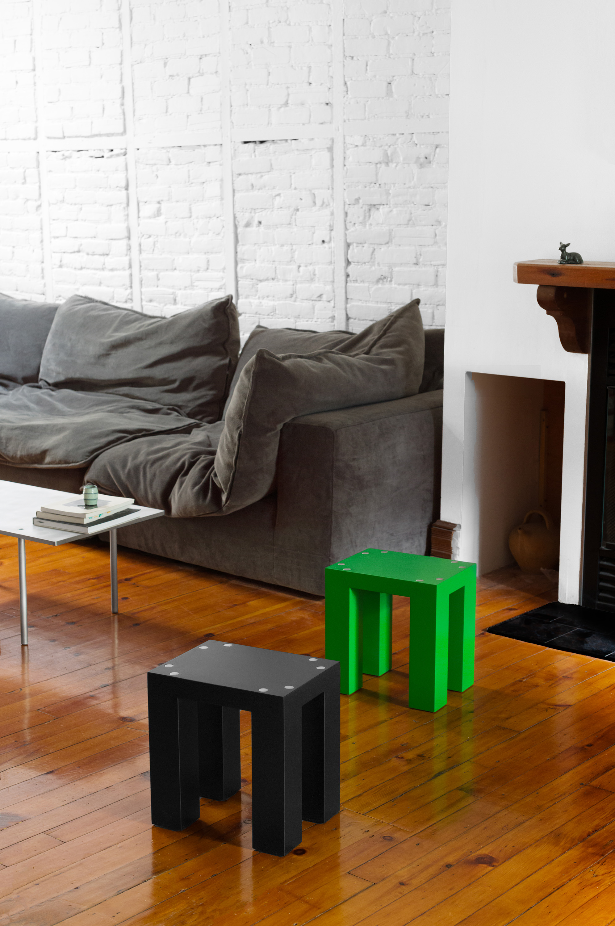Dice in green and black in a home setting.