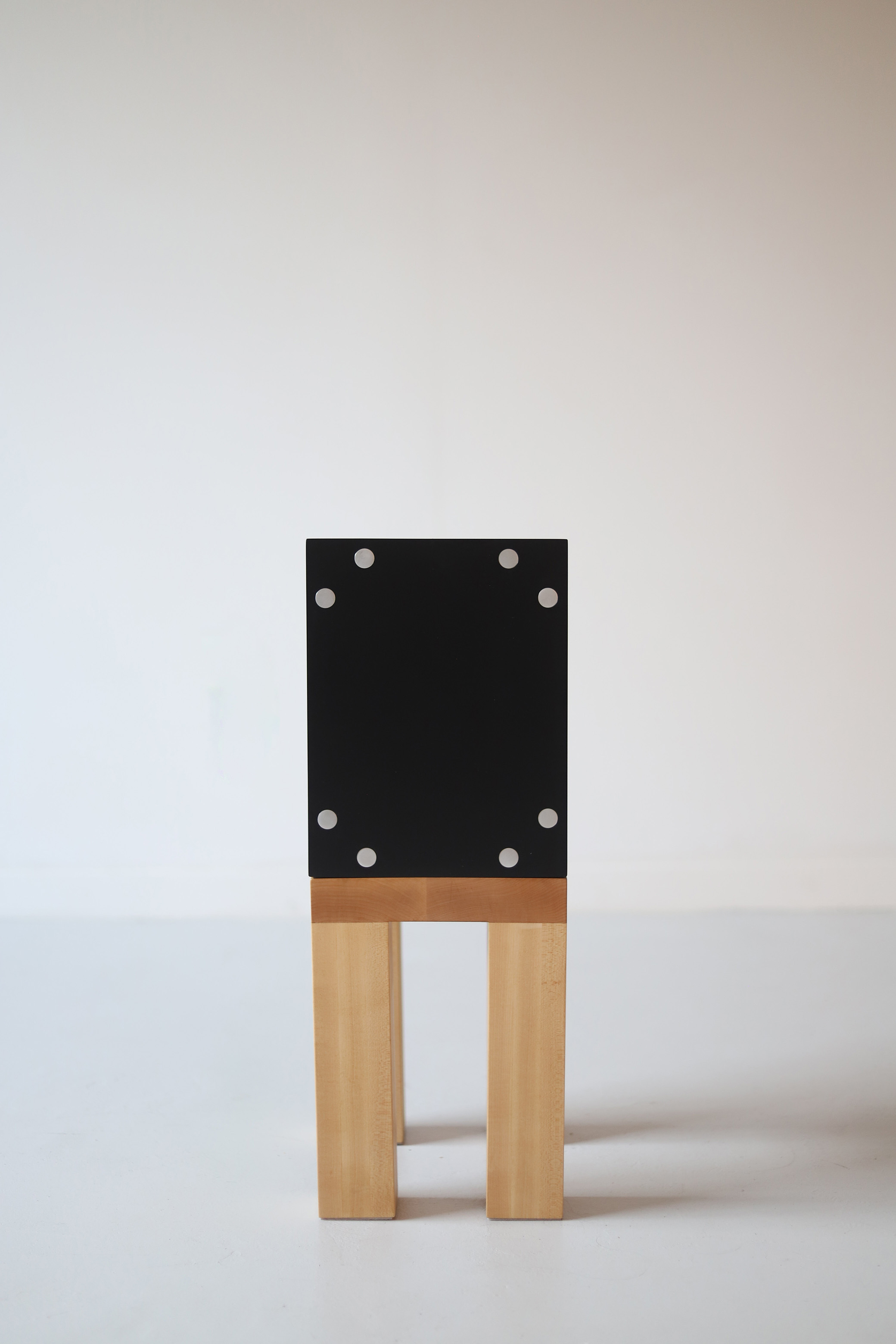 Dice in natural and black.